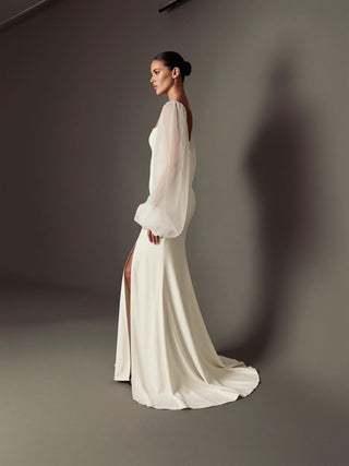 Made-to-measure Primrose mermaid in stretch crepe with sheer tulle bishop sleeves and a high front slit