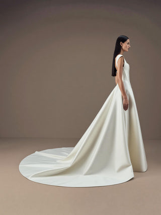 Rosalind duchess satin wedding dress with a visible corset bodice and a full skirt