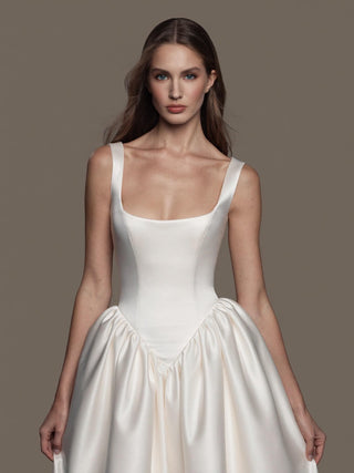 The Verity duchess satin gathered ballgown with scoop neck, wide straps, and basque waist, made-to-measure by Sylk Atelier