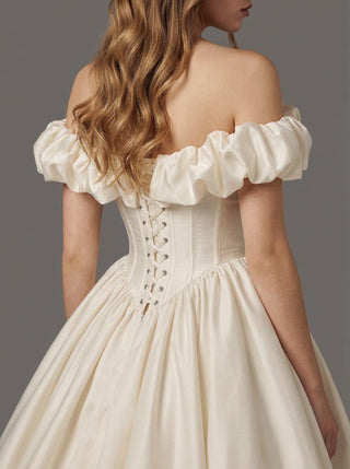 Beaumont duchess satin ballgown wedding dress with a voluminous puff ruffle and a lace-up corset back