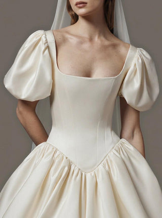 Blanche duchess satin wedding dress with a square neck and a basque waist