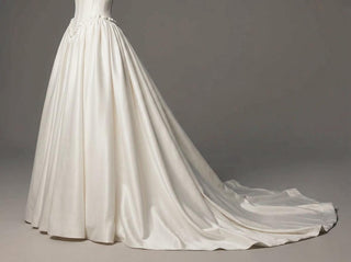 Made-to-measure Delphine ballgown in duchess satin with an off-shoulder ruffle and a cathedral train