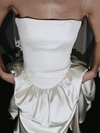 Hever strapless duchess satin ball gown wedding dress with a boned corset bodice and cathedral train