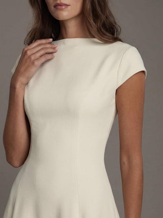 Made-to-measure Bronte A-line in stretch crepe with a bateau neckline and a clean skirt