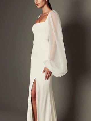 Primrose stretch crepe wedding dress with a square neck and a high front slit