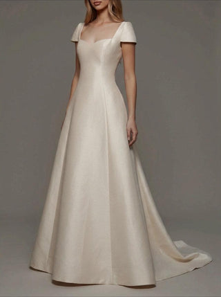 Hatfield silk faille wedding dress with structured cap sleeves and a clean skirt