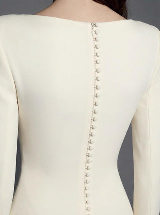 Ashcombe silk cady fit-and-flare wedding dress with a bateau neck and a fitted skirt