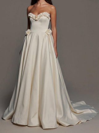 Georgiana duchess satin wedding dress with hip rosettes and a lace-up back