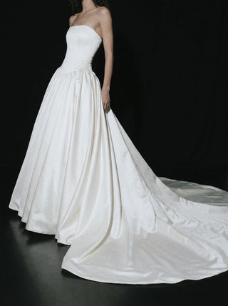 Hever duchess satin wedding dress with a full corset lace-up back in metal eyelets and a cathedral train
