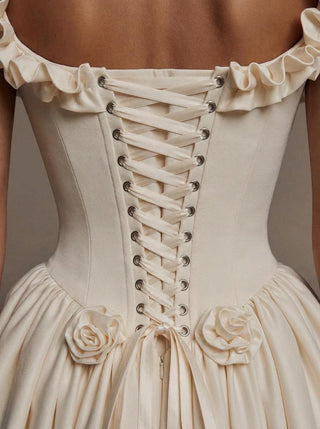 Made-to-measure Pompadour ballgown in duchess satin with a ruffled neckline and hip rosettes