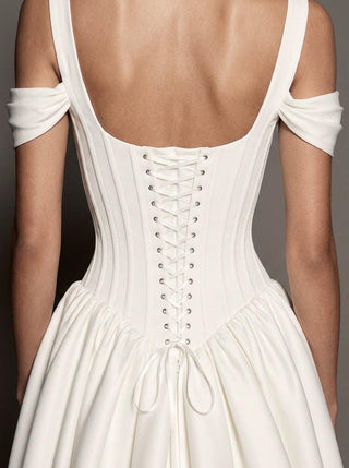 Isolde silk mikado wedding dress with a lace-up corset back and a draped bodice