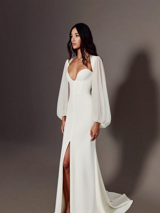 Made-to-measure Allegra mermaid in stretch crepe with sheer organza bishop sleeves and a high front slit