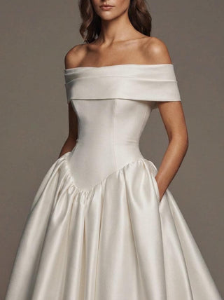 Made-to-measure Ottoline ballgown in silk mikado with an off-shoulder portrait collar and a cathedral train