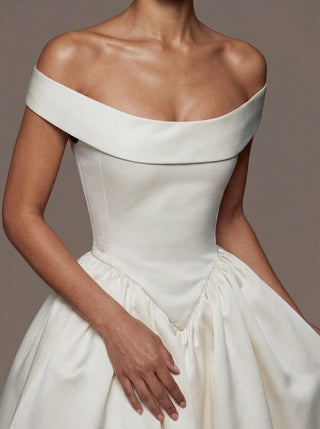 Made-to-measure Stratford ballgown in mikado with a portrait collar and covered buttons