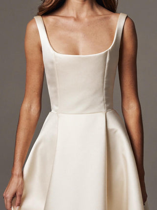 The Welbeck duchess satin A-line wedding dress with square neckline, wide straps, and open back, made-to-measure by Sylk Atelier