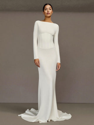 Seraphine silk cady wedding dress with a bateau neckline and a deep V back