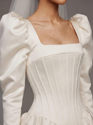 Medici duchess satin ballgown wedding dress with long puff sleeves and a square neck