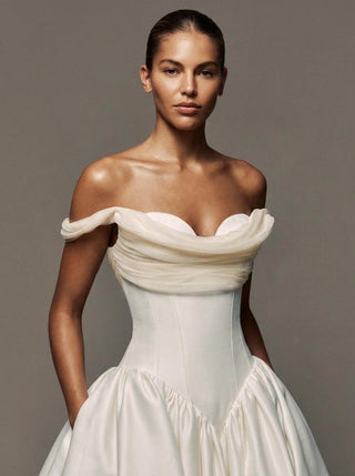 Made-to-measure Wilderness ballgown in silk faille with an off-shoulder corset bodice and a cathedral train