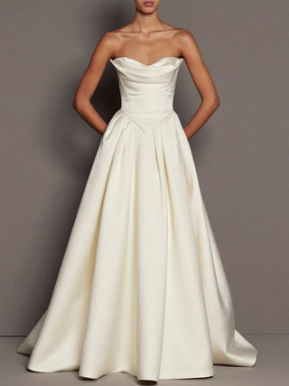 The Chatsworth silk mikado strapless ballgown with draped sweetheart, basque waist, and hidden pockets, made-to-measure by Sylk Atelier