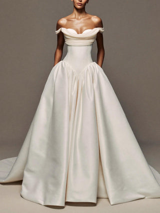 Wilderness silk faille wedding dress with an organza overskirt and a cathedral train