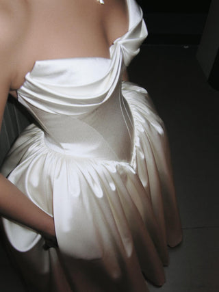 Sandringham duchess satin ball gown wedding dress with a draped sweetheart bodice and pointed basque waist