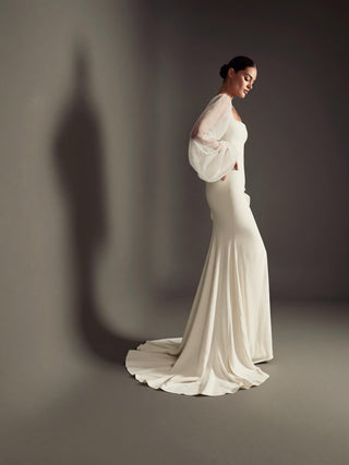 Made-to-measure Primrose mermaid in stretch crepe with sheer tulle bishop sleeves and a high front slit