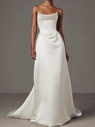 The Celestine strapless duchess satin A-line wedding dress with dropped V basque waist, made-to-measure by Sylk Atelier