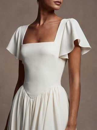 Eglantine silk crepe A-line wedding dress with flutter sleeves and a boned bodice