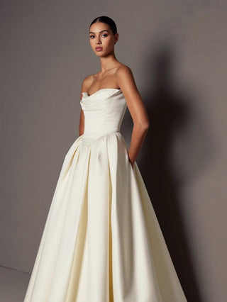 Made-to-measure Chatsworth ballgown in silk mikado with a draped sweetheart neckline and in-seam pockets