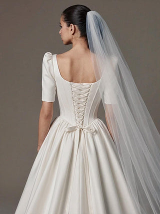 Cecily duchess satin wedding dress with a scoop neck and a corset bodice