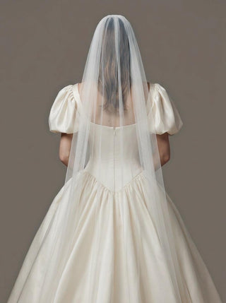 Made-to-measure Blanche ballgown in duchess satin with balloon sleeves and a basque waist