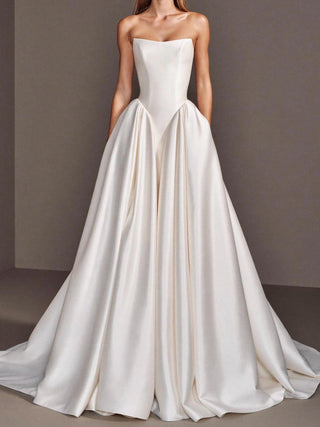 Made-to-measure Linnet ballgown in duchess satin with a strapless sweetheart neckline and a dropped basque waist