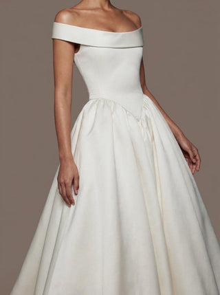 Stratford mikado wedding dress with a basque waist and covered buttons