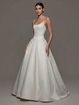 Vivienne duchess satin wedding dress with a boned bodice and covered buttons