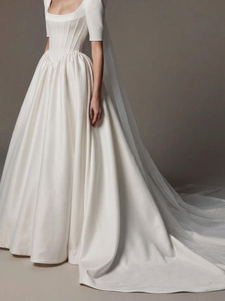 Cecily duchess satin A-line wedding dress with short puff sleeves and a scoop neck