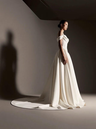 Made-to-measure Isolde ballgown in silk mikado with an off-shoulder cowl neck and a draped bodice