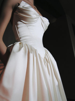 Sandringham duchess satin ball gown wedding dress with a draped sweetheart bodice and pointed basque waist