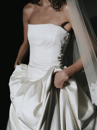 The Hever duchess satin strapless corset ballgown with cathedral train and pockets, made-to-measure by Sylk Atelier